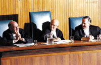Justices of the Supreme Court Major, Iaccobucci, and Binnie at the Grand Moot, 2002