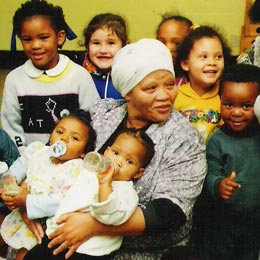 Maggie with the children at the crèche