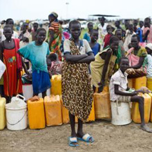 Girls waiting in line for water in the UNMISS camp near Bentiu, South Sudan