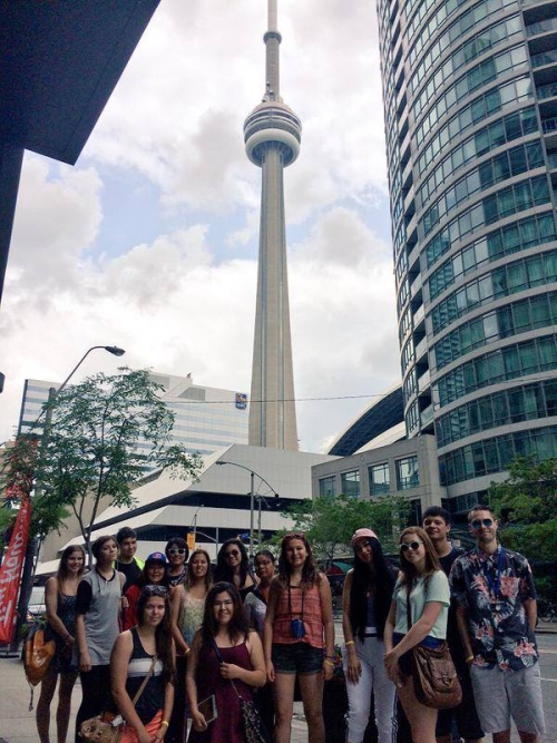 Aboriginal youth group shot in front of CN Tower