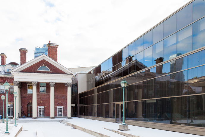 Falconer Hall reflected in Bora Laskin Law Library windows