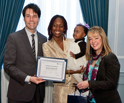 ITL program graduate receiving certificate