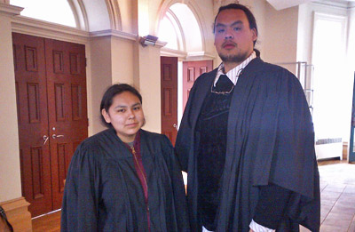The judges of the mock trial activity suit up in robes in preparation for trial