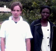 T.J. Riddell with staff member from the Legal Aid Project of Uganda