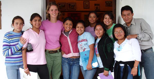 IHRP intern Sarah McEachern with her English students and the director of the project, outside the Casa del Niño office