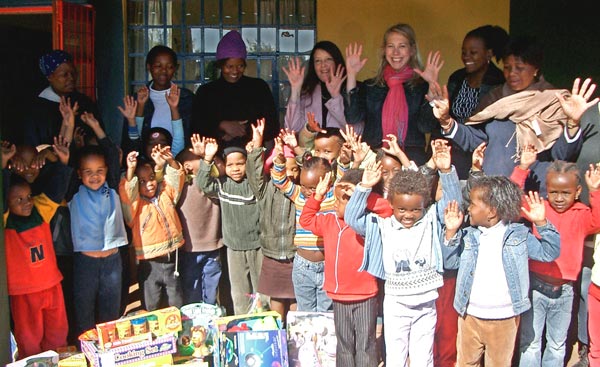 Laura Baron with kids from the Hapy D daycare