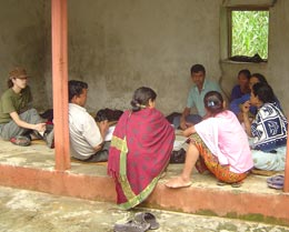 Janye Lee (left) attends a meeting