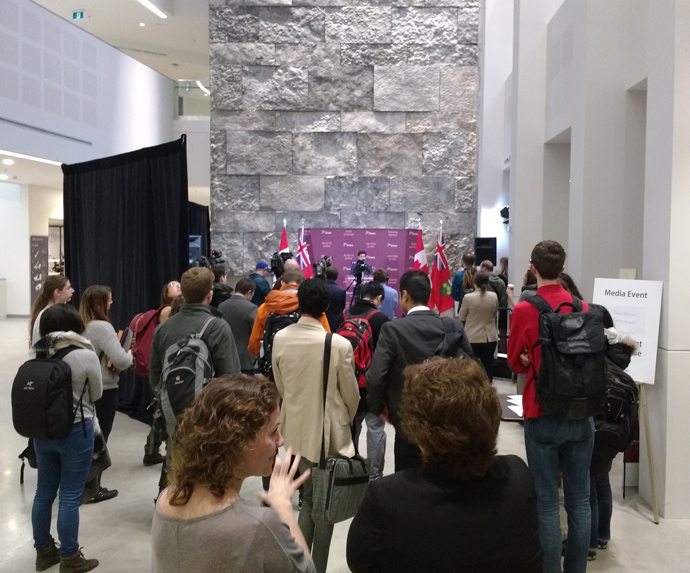 Students, faculty and staff watch the Ontario AG press conference