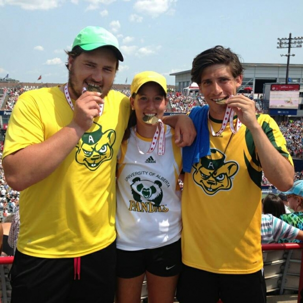 Erika Voaklander with winning medal in mixed doubles competition at U of A