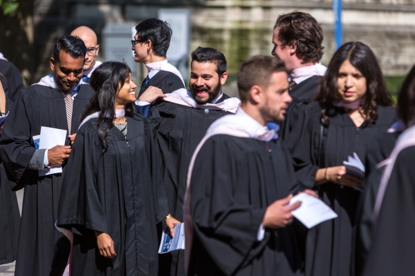 law grads walking into Convocation Hall