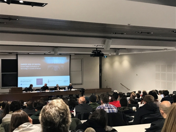 Full house in the Moot Court Room, view from the back of the room