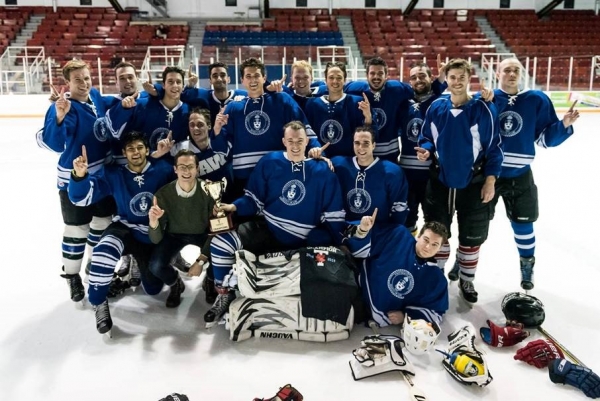 U of T Law's men's intramural hockey team group shot on the ice