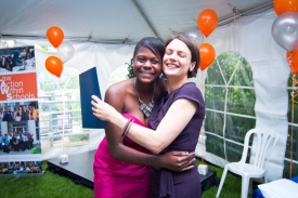 LAWS program director Sarah Pole, right, hugs a LAWS student, left
