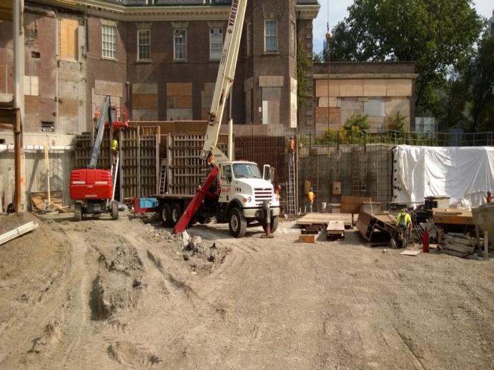 base of the construction pit with digger at work