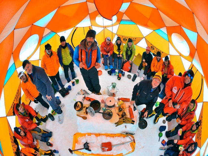 Inside one of the tents with food camping gear visible