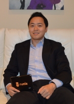 Harve Lam with a Rumie tablet