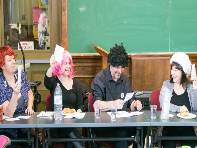 Panel judges with fun wigs
