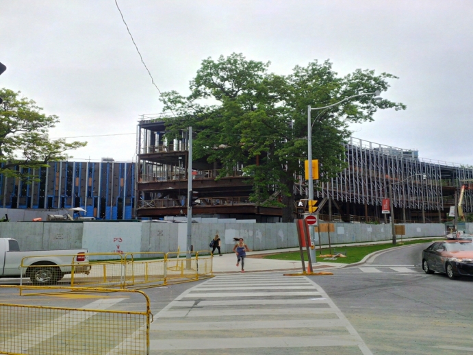 South view of construction building looking north on Queen's Park Crescent