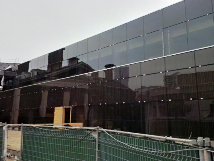 Close up of Flavelle House reflected in new window tiles of law library