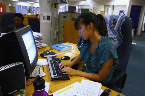 Karen Chen working in Johannesberg newsroom