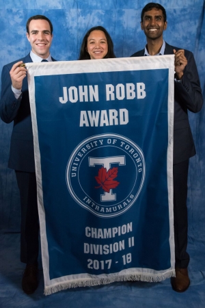 law students holding intramural banner