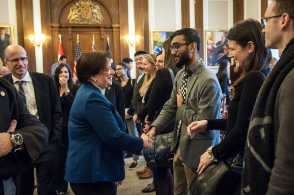 Justice Kagan shakes hands and chats with students after the convocation ceremony 