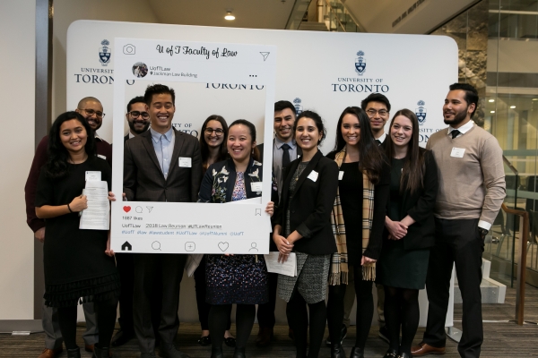 Group shot of student ambassadors at Reunion with Instagram frame