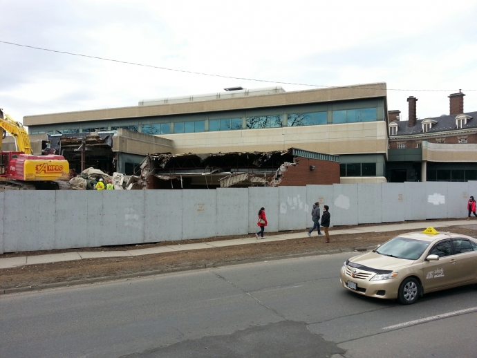 View of Moot Court demolition and large excavator from Queen's Park Cresent