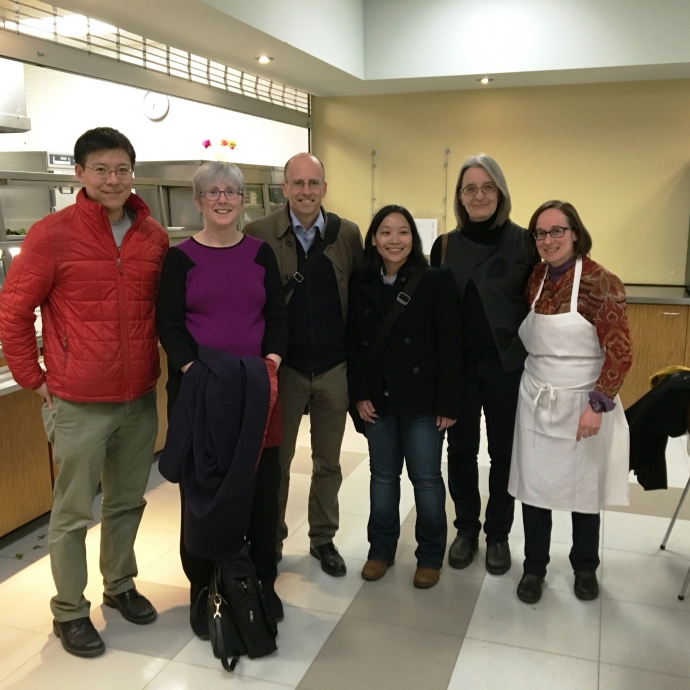 Faculty in a group photo at Lawyers Feed the Hungry cafeteria