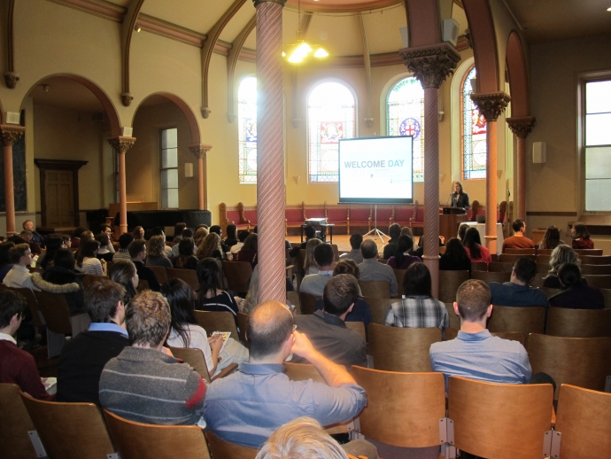 group of incoming students sitting in auditorium for Welcome Day 2014