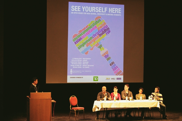 Diverse students at a panel on stage at See Yourself Here open house