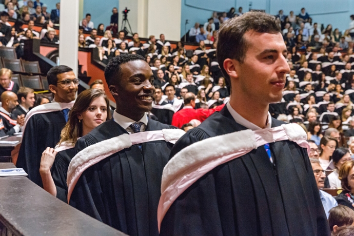 group of law students waiting to step onto dais in Convocation Hall