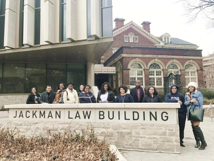Members of the Thurgood Marshall Pre-Law Society of SUNY Binghamton outside in front of the Jackman Law Building with Black Law Students Association students from U of T
