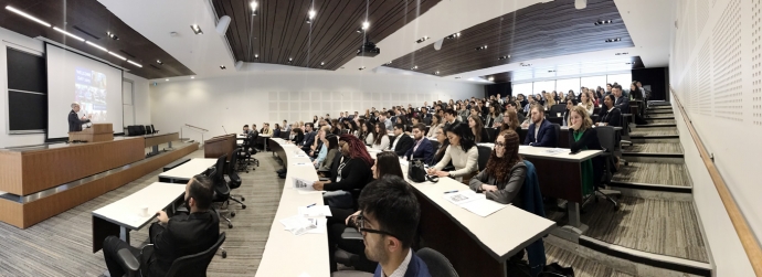 Panoramic view of the Dean addressing students at the opening of Welcome Day 