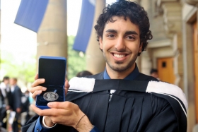 Graduate Shan Arora shows his Governor General Silver Medal