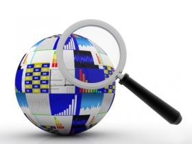 illustration of a magnifying glass looking at globe with international financial figures