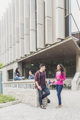 law students in front of Jackman Law Building entrance