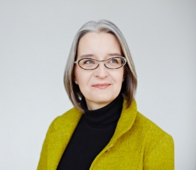 headshot of professor lisa austin
